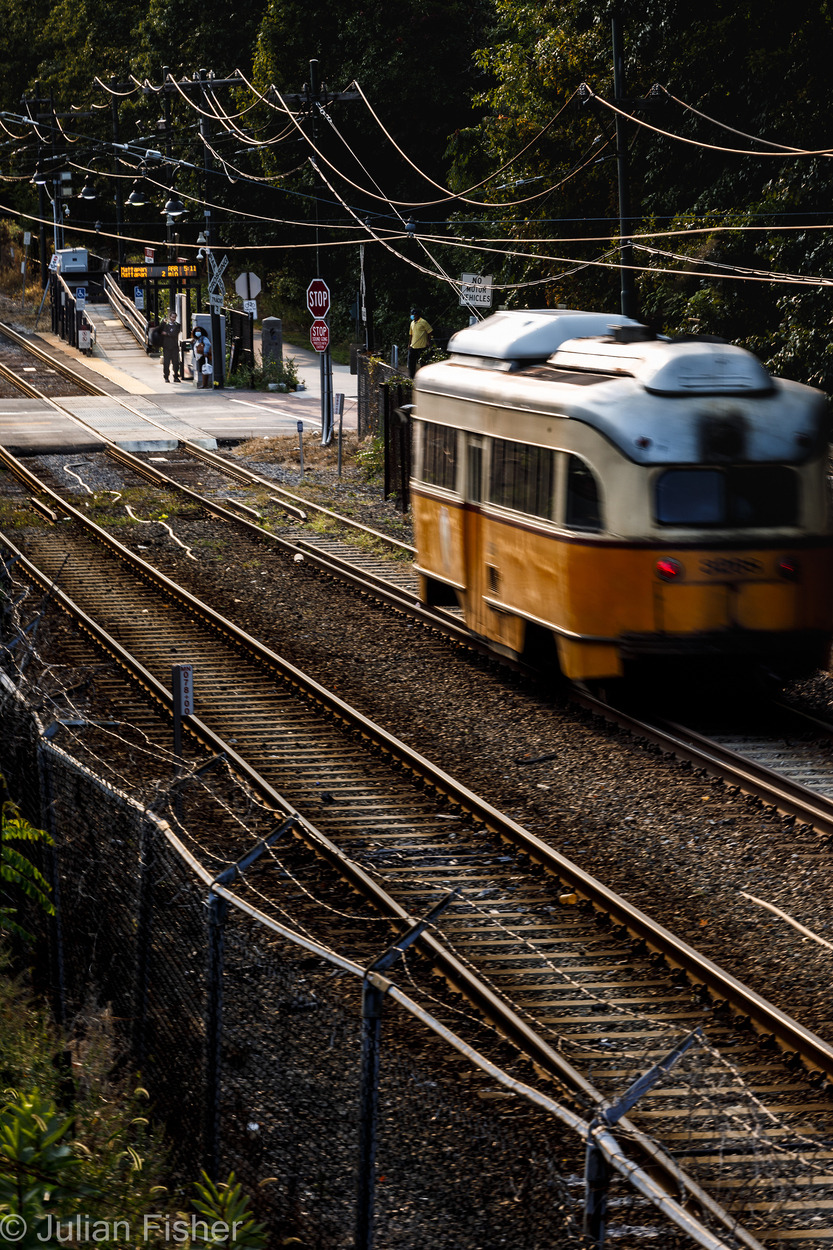 orange trolley on a track