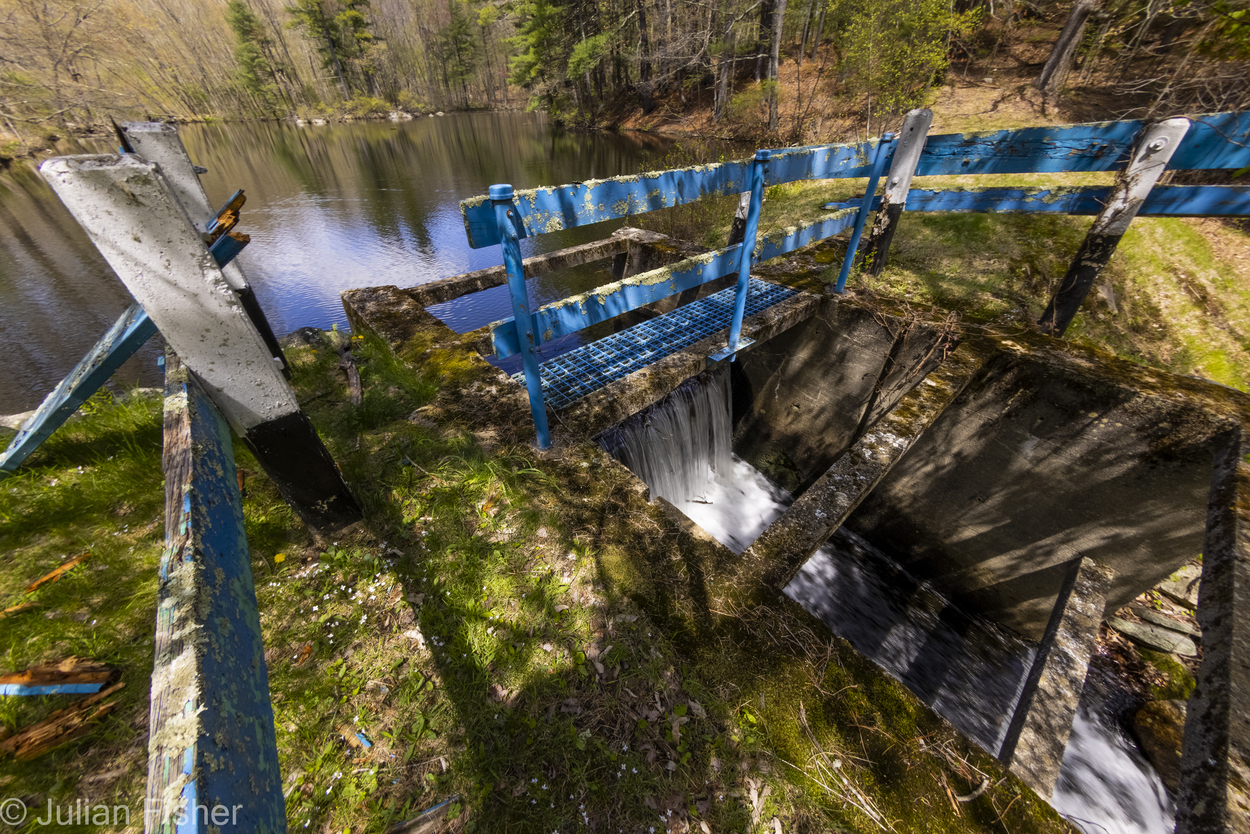 a dam below a fence